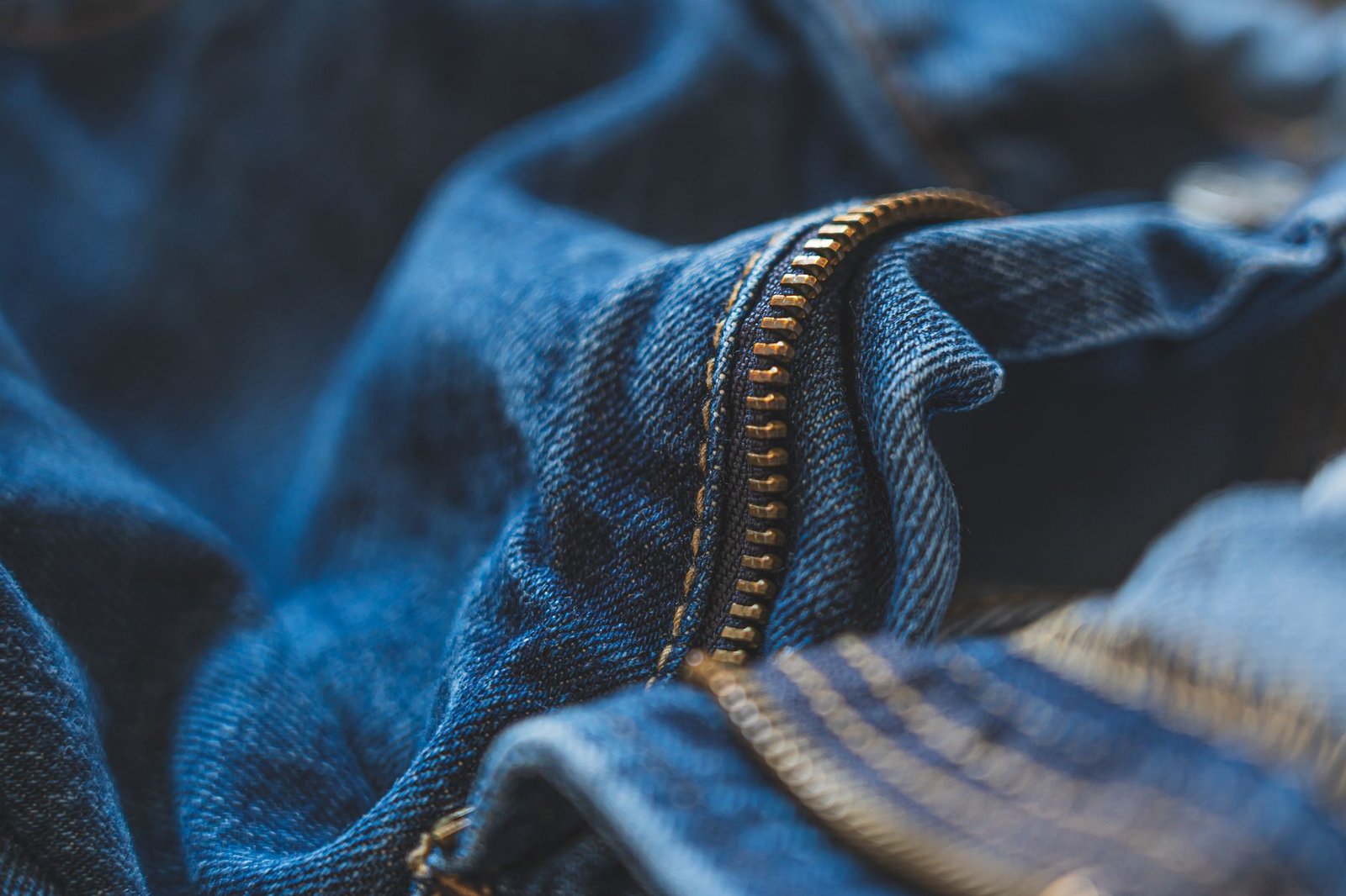 a close-up of two different pouch seams on boxer briefs, one flat and one with a structured panel
